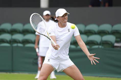 Iga Swiatek aiming to serve up storm at Wimbledon amid wide-open field