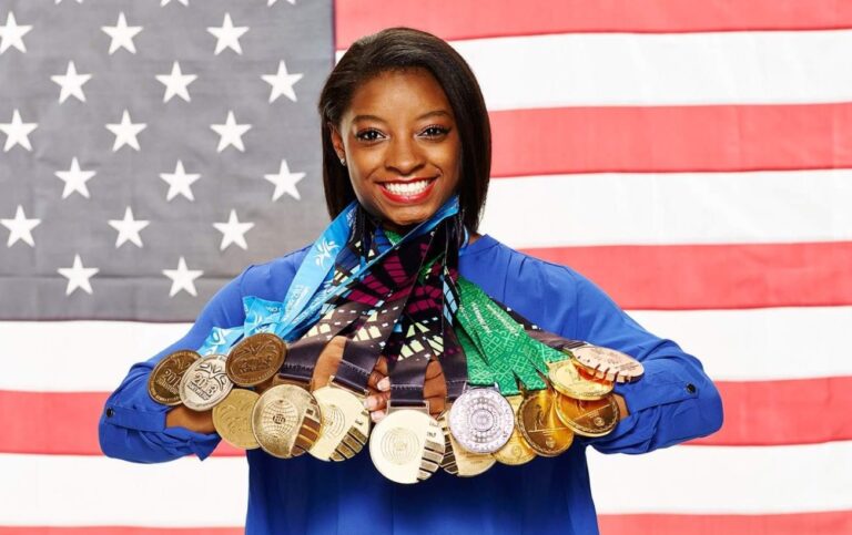 Simone Biles poses with every single Olympic medal and has message for six-year-old self